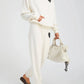SPRWMN-Heart-Sweatpants-Creme-Black